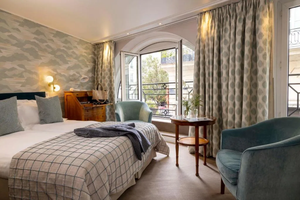 Hôtel Le Regent Paris — charming 18th-century hotel on rue Dauphine in Saint-Germain with 25 pastel rooms and breakfast in a vaulted cellar