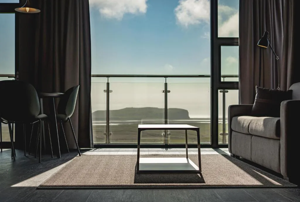 Black Beach Suites in Vík, design suites with sweeping views over the black sand beaches of Reynisfjara in south Iceland