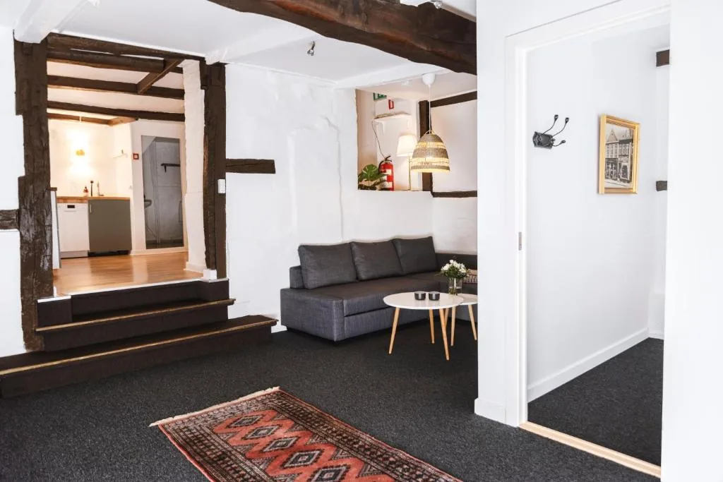 Hotel Hamlet à Elseneur au Danemark, boutique-hôtel XIXe siècle au cœur du vieux port à 150 m de la gare et du terminal ferry, proche du château de Kronborg de Shakespeare
